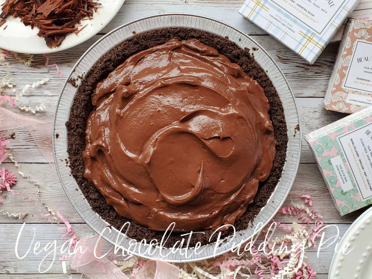 Vegan Chocolate Pudding Pie with Beauty Bar Chocolate is super creamy, just the right amount of sweet, with homemade chocolate shavings.