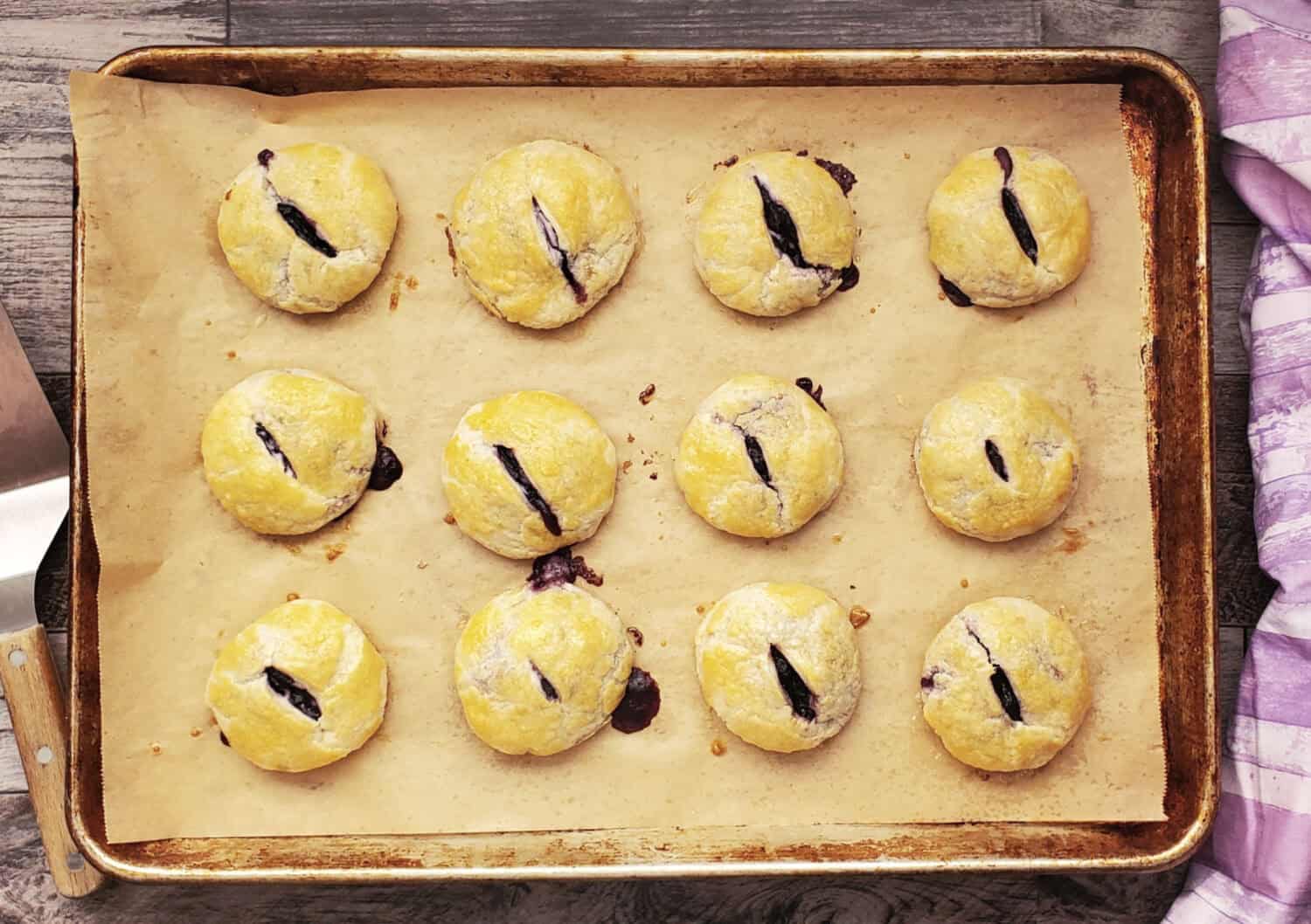 Blueberry Cream Pie Poppers are the perfect two-bite luscious berry mini pies that are easy to make, same buttery flaky crust, snack size. Half the amount of crust of hand pies, but all the filling crammed into a mini!